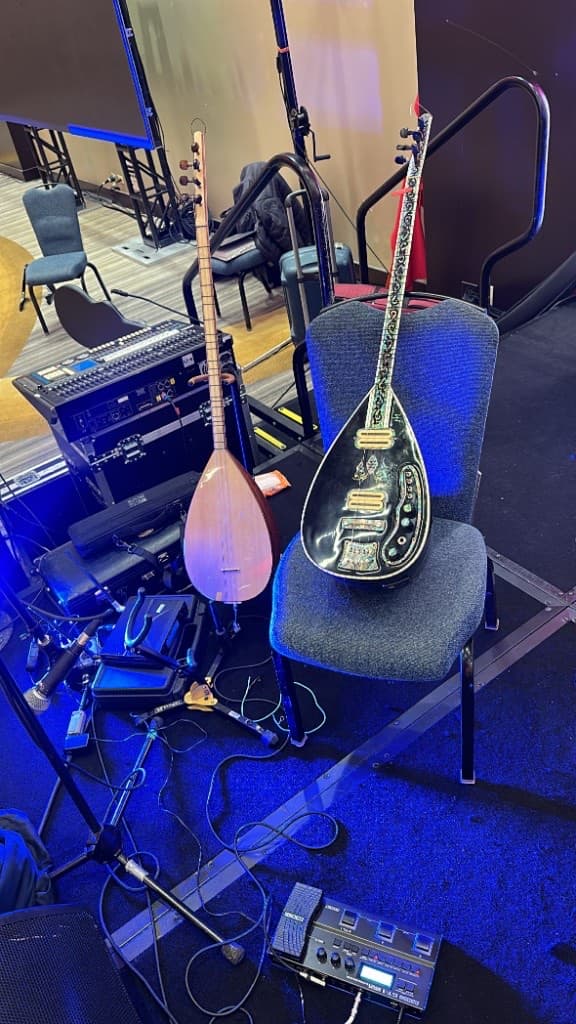 Concert baglama setup — acoustic and electric baglama on stage.