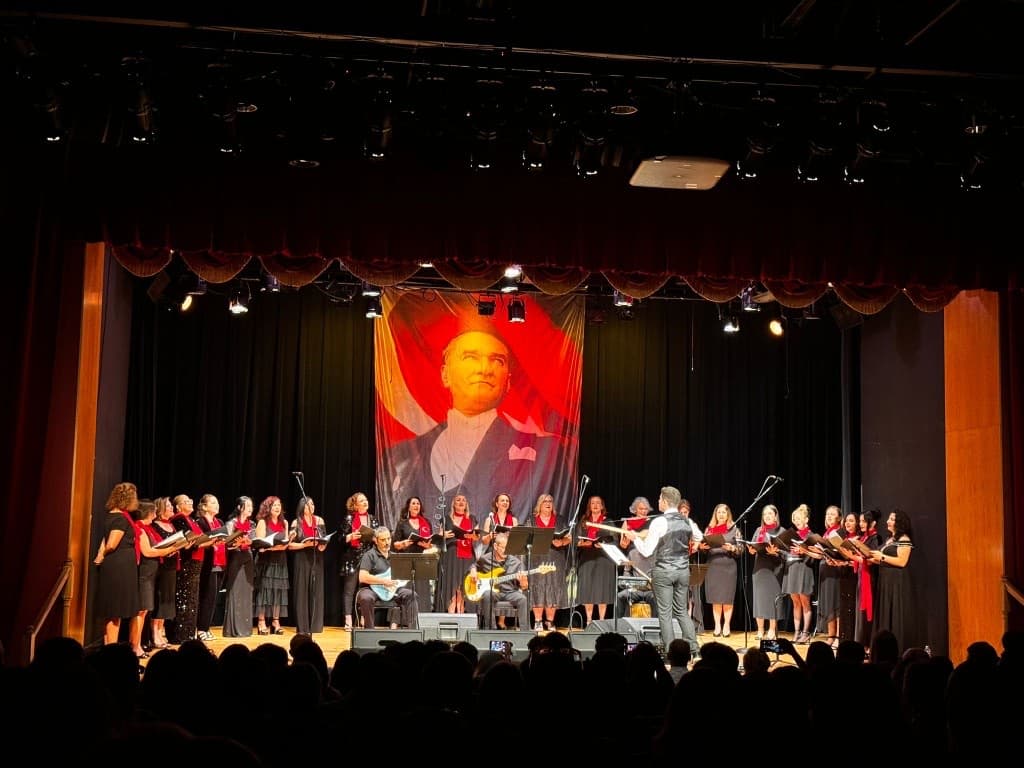 Turkish Music Choir on stage during a concert.